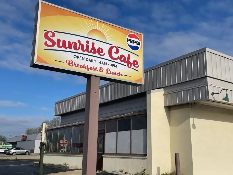 Sunrise Cafe storefront with billboard sign in Decatur, IL